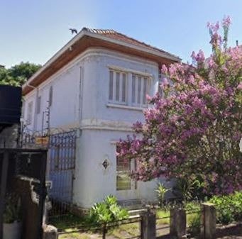 Casa com 415m², 5 dormitórios, 3 vagas no bairro Menino Deus em Porto Alegre para Comprar